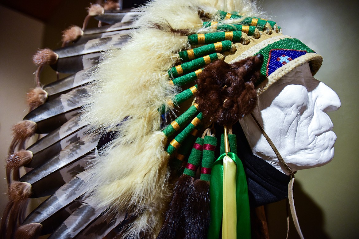 Mixed media artwork titled "Chief's Headdress, Plains Style" by Jim Woulfe, with beadwork by Margaret Miller at the Members' Salon 2022 exhibit at the Hockaday Museum of Art in Kalispell on Thursday, Jan 20. (Casey Kreider/Daily Inter Lake)