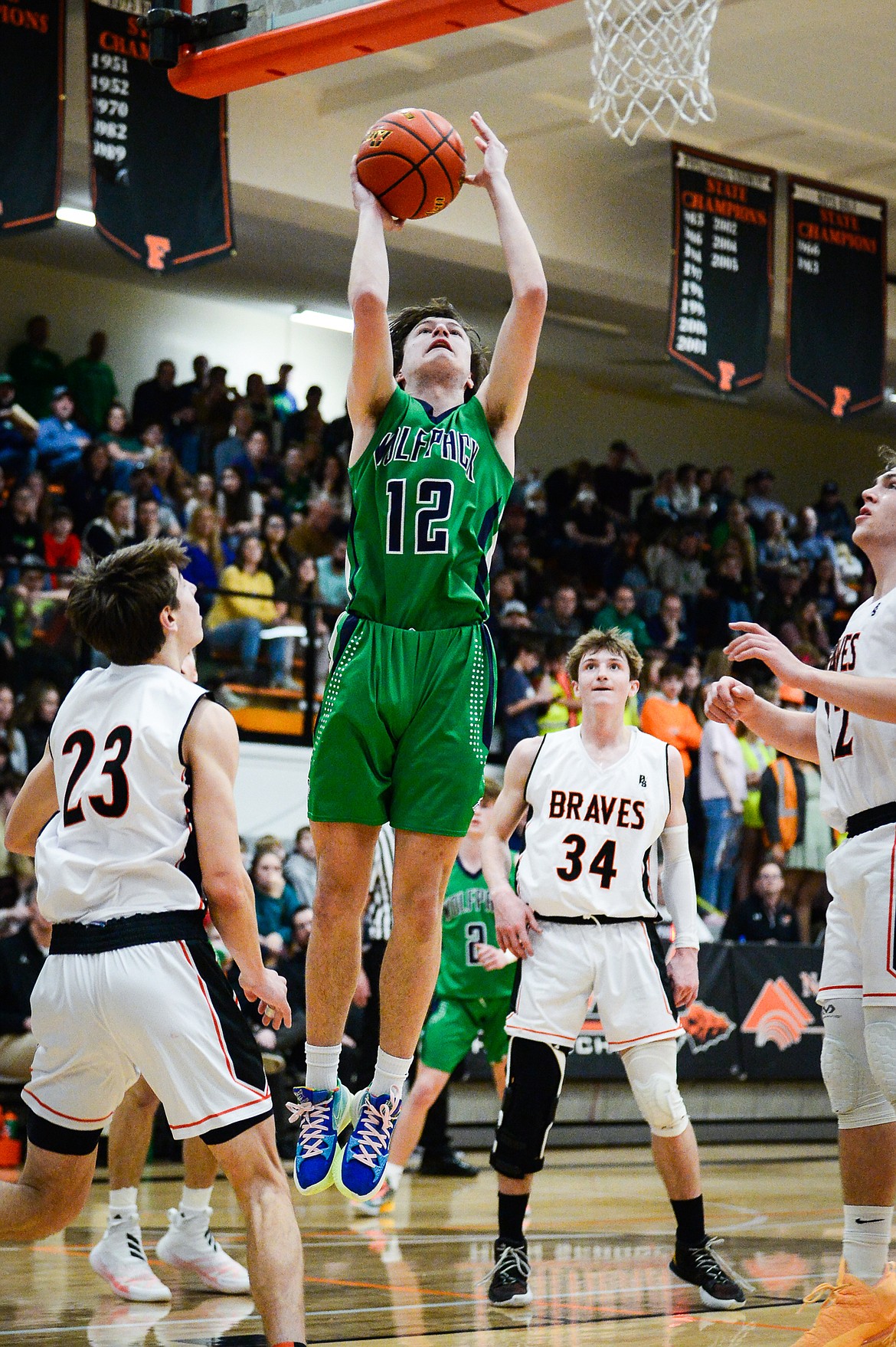 Glacier's Kyson Wagner (12) drives to the basket against Flathead at Flathead High School on Friday, Jan. 21. (Casey Kreider/Daily Inter Lake)