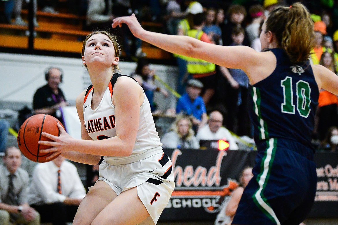 Flathead's Olivia Pate (2) looks to shoot against Glacier's Bethany Sorensen (10) at Flathead High School on Friday, Jan. 21. (Casey Kreider/Daily Inter Lake)