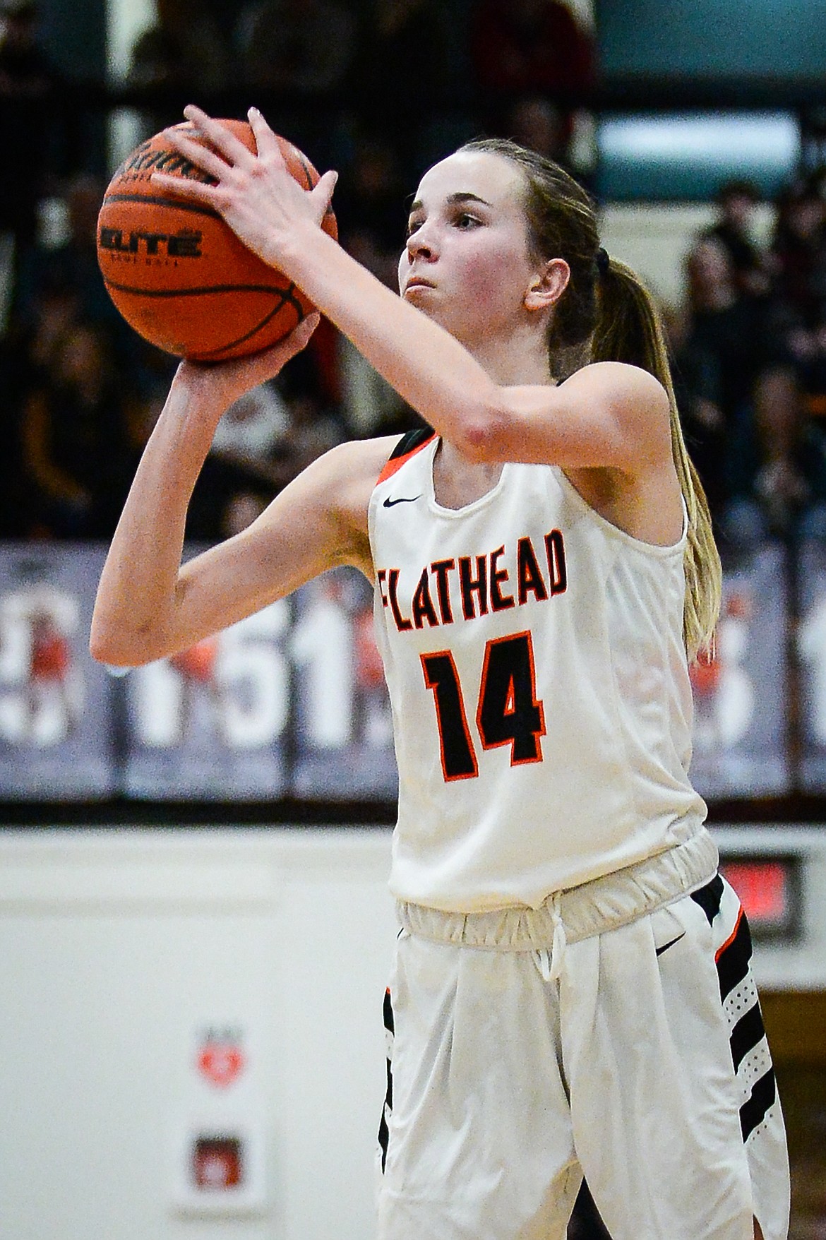 Flathead's Kennedy Moore (14) gets an open look at a three-pointer against Glacier at Flathead High School on Friday, Jan. 21. (Casey Kreider/Daily Inter Lake)