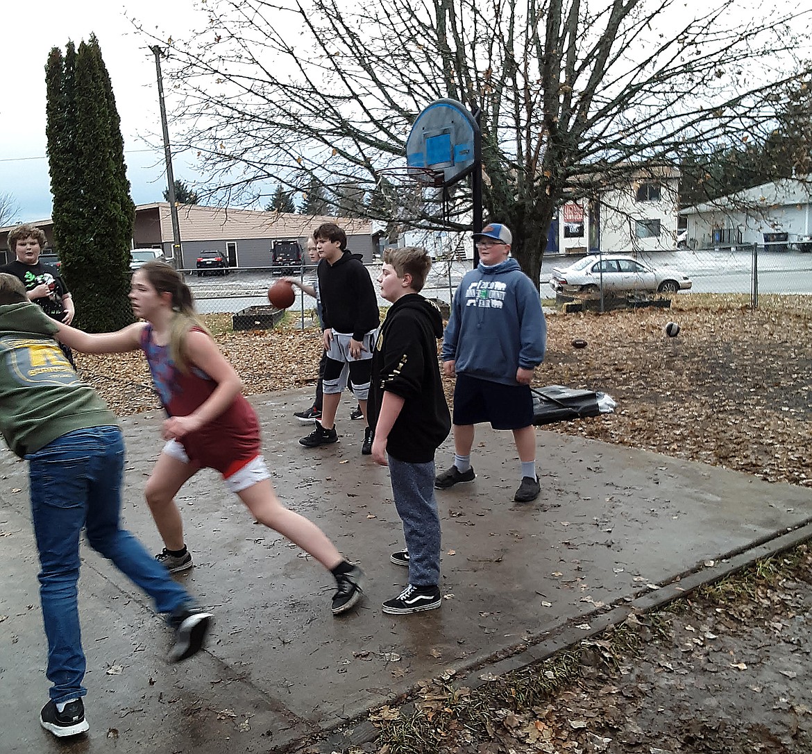 Area youth play basketball at the Sandpoint Teen Center, one of many activities available for area teens at the center, located at 7B Bowling Lanes on N. Division Avenue in Sandpoint.