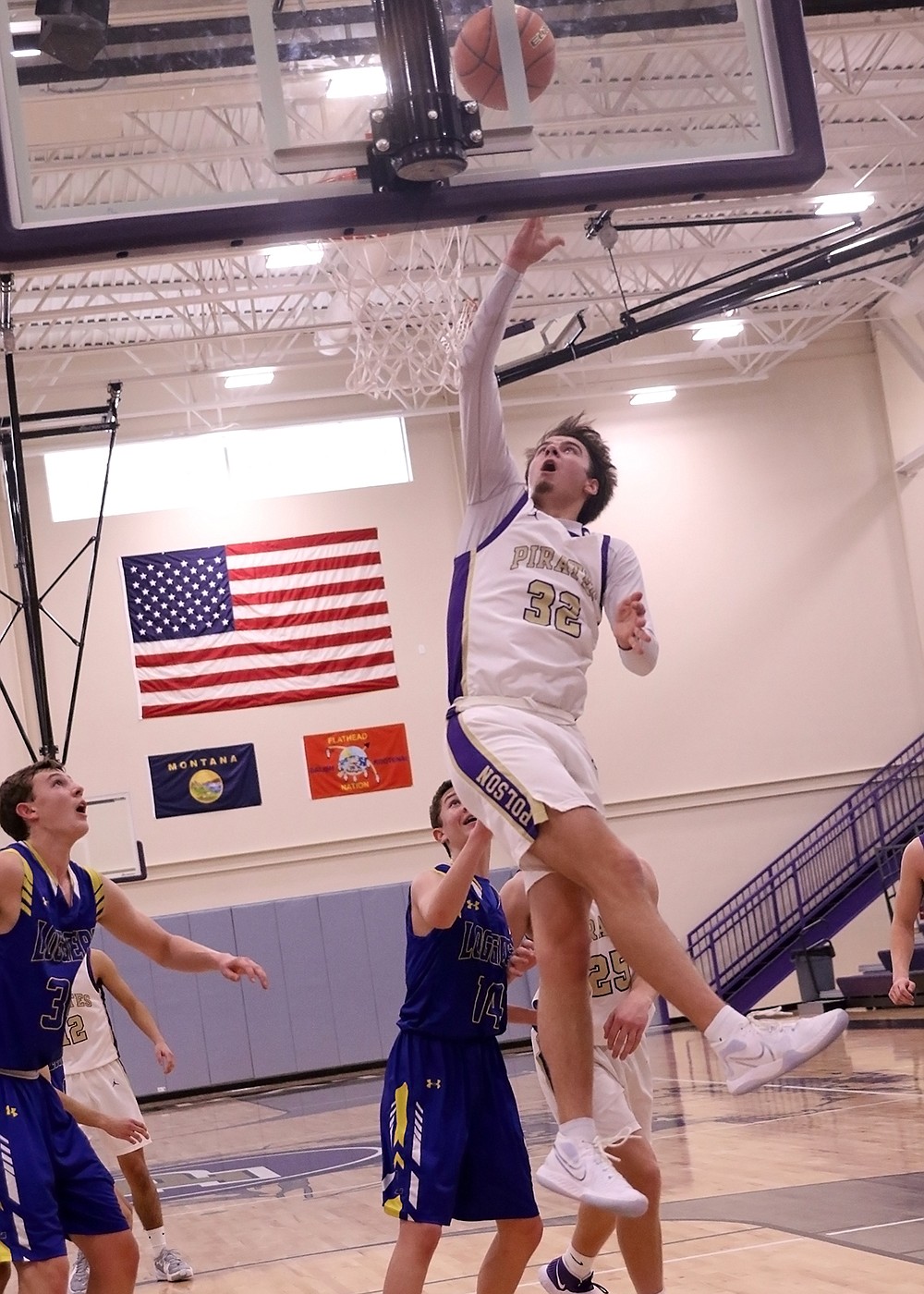 Colton Graham rises for a shot against Libby. (Courtesy of Bob Gunderson)