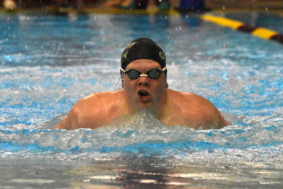 Quincy High School sophomore Robert Bensch races in the 100-yard butterfly event at Moses Lake High School on Friday.