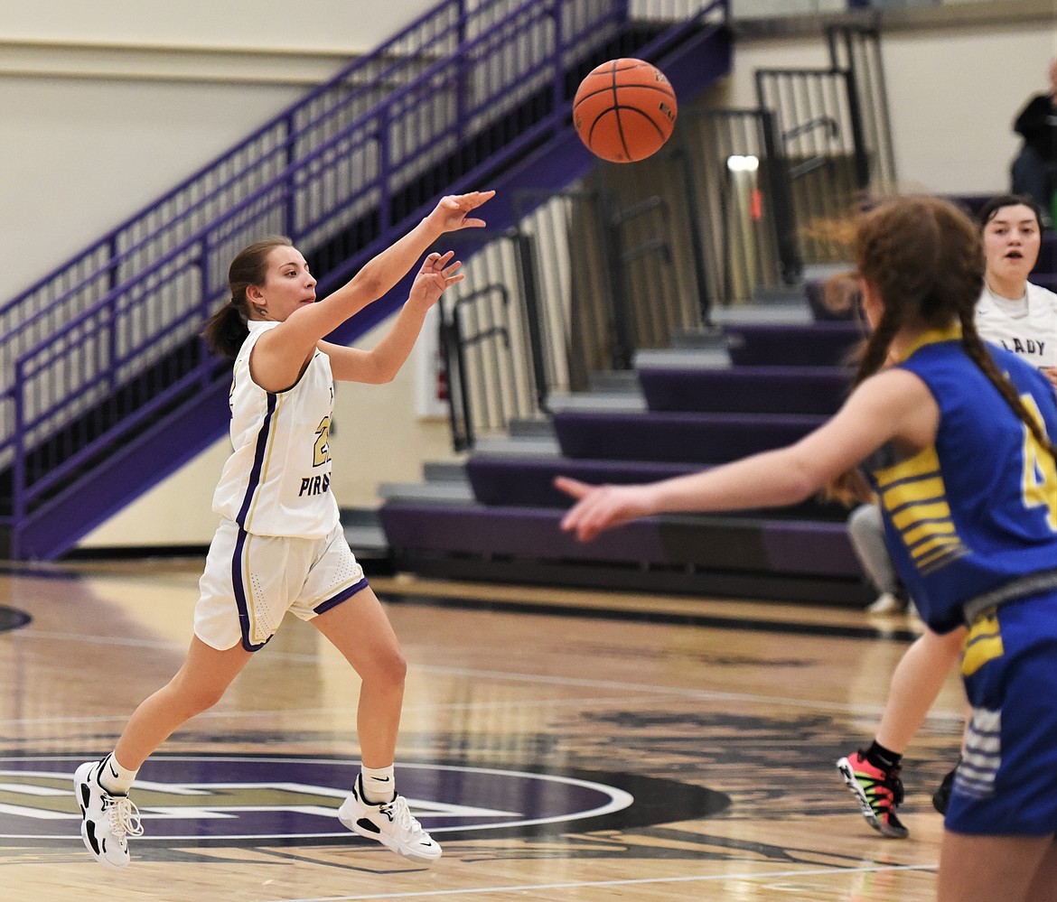 Polson's Lexi Wirz makes a pass against Libby. (Scot Heisel/Lake County Leader)