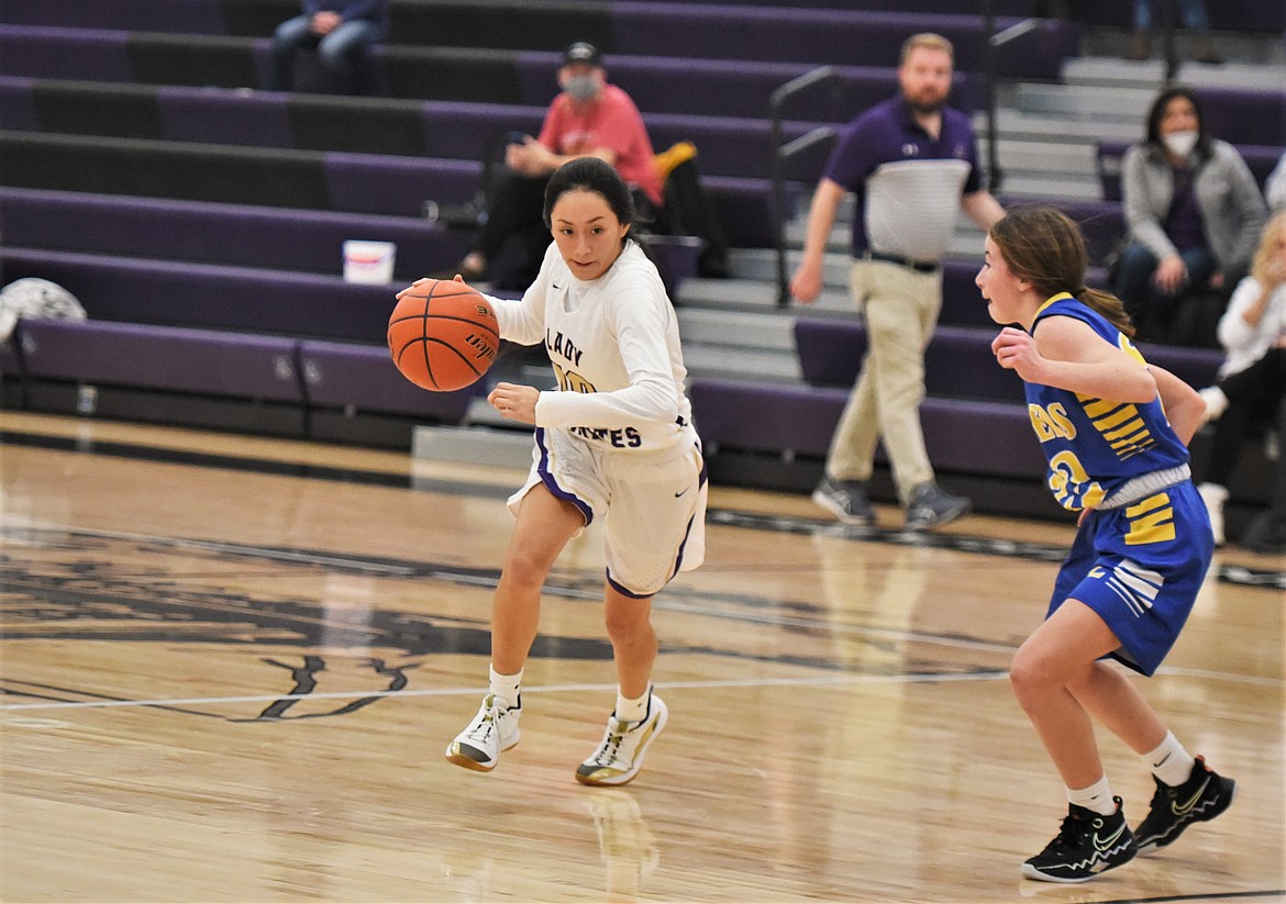 Polson's Jaivin Bad Bear looks for some room against Libby. (Scot Heisel/Lake County Leader)