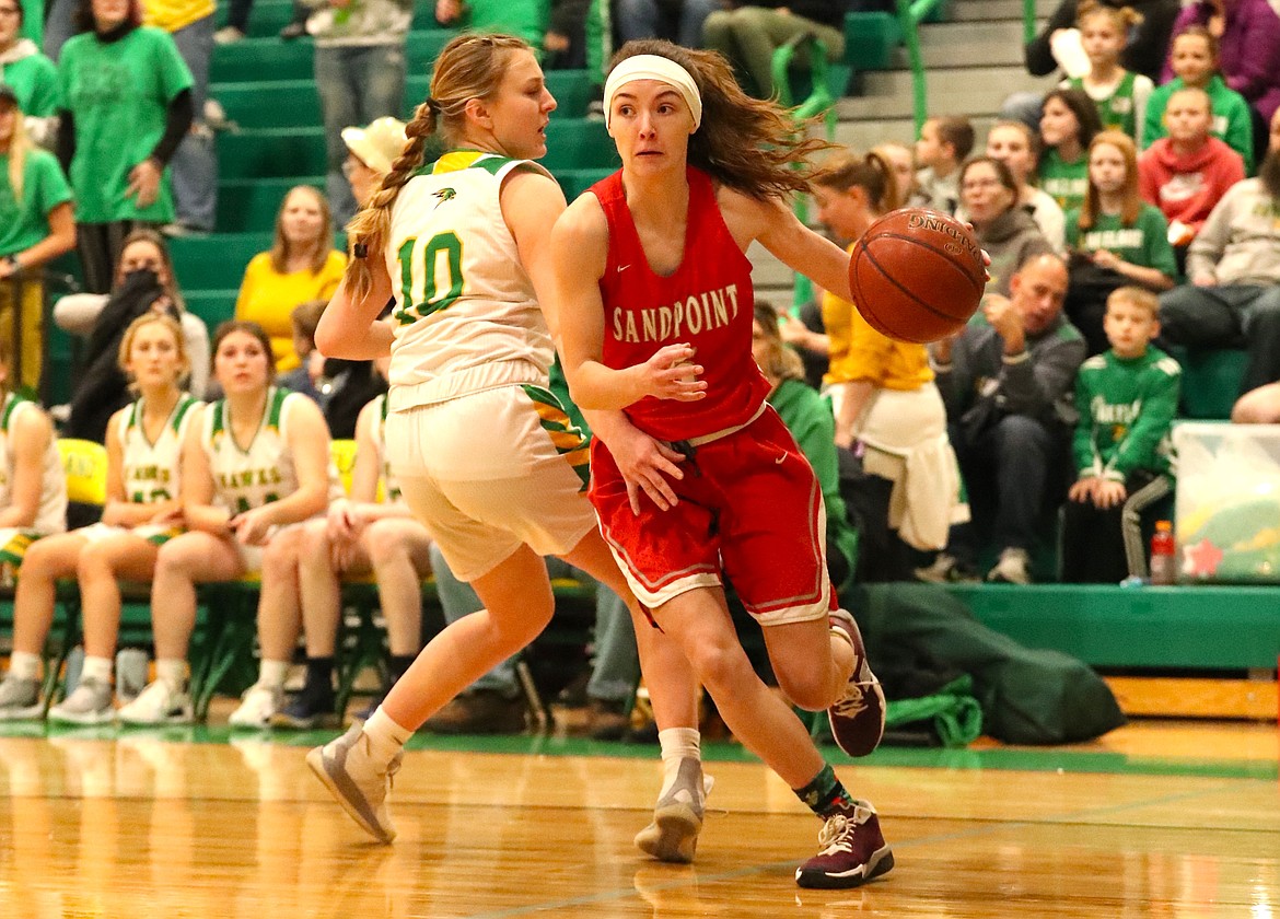 Anna Reinink turns the corner and heads toward the paint Friday.