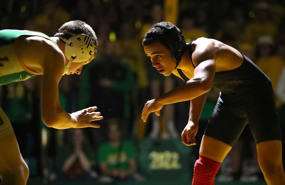 Ashlei Hawkins (right) competes in Friday's dual at Lakeland.