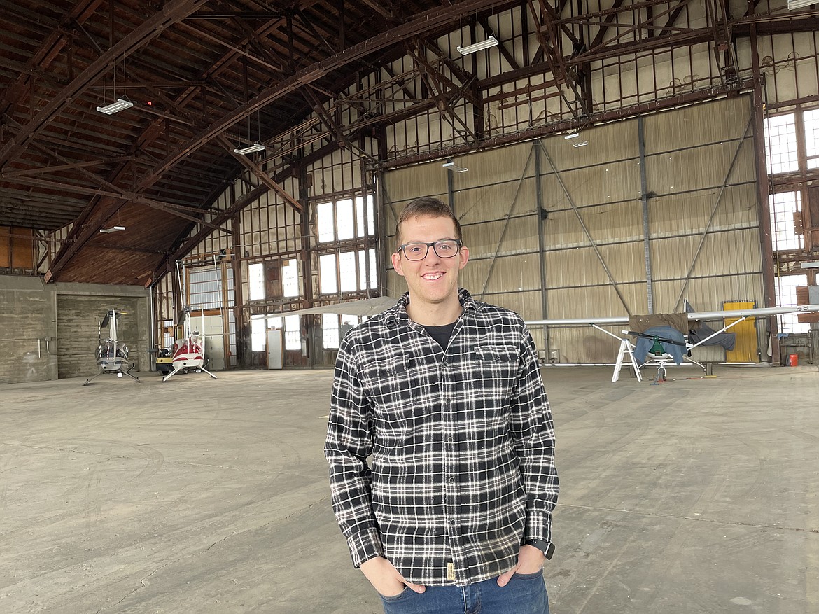 Josiah Barrett, owner of Barrett Aircraft, stands in the midst of one of the giant, World War II-era hangars at the Ephrata Municipal Airport.