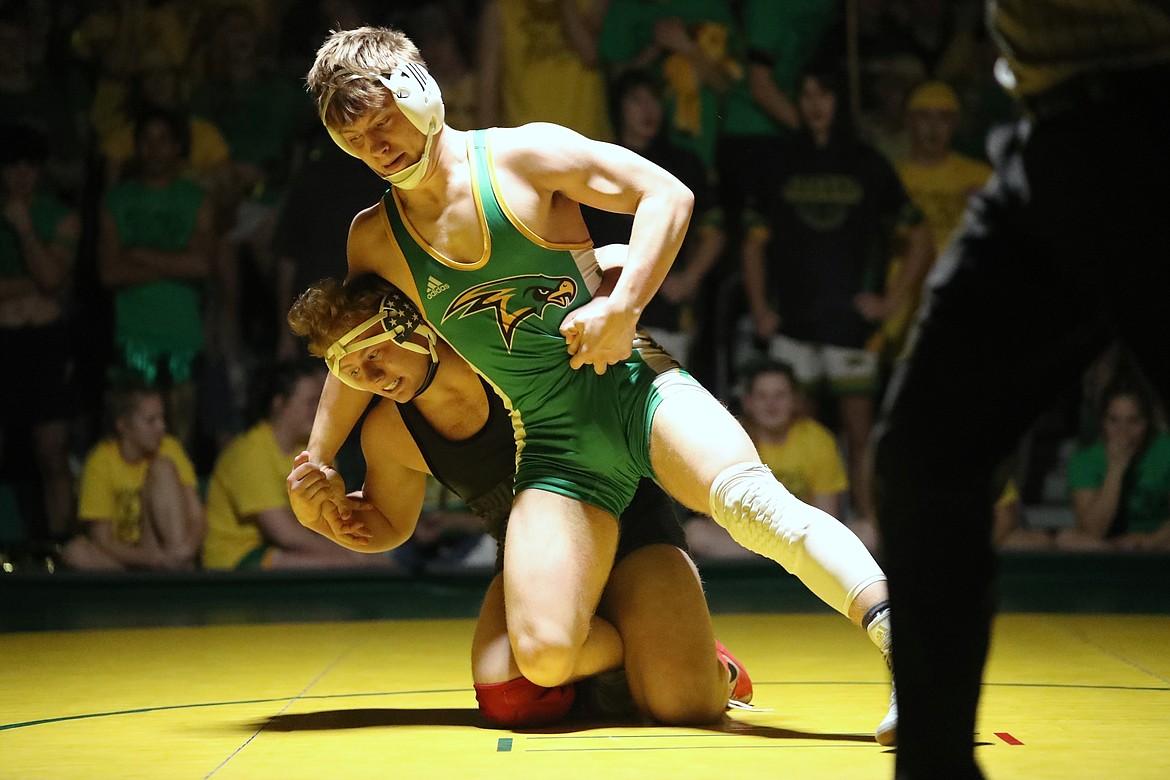 Blake Sherrill (bottom) takes down his opponent during Friday's dual at Lakeland.