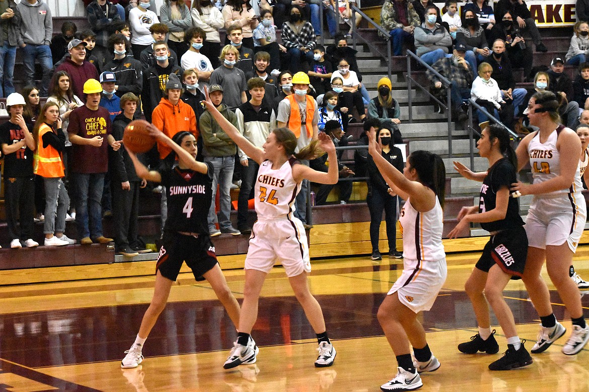 Moses Lake High School junior Teagan Wiltbank (24) puts her hand up to try to block a pass by Sunnyside High School senior Alyna Ramirez (4) on Saturday.