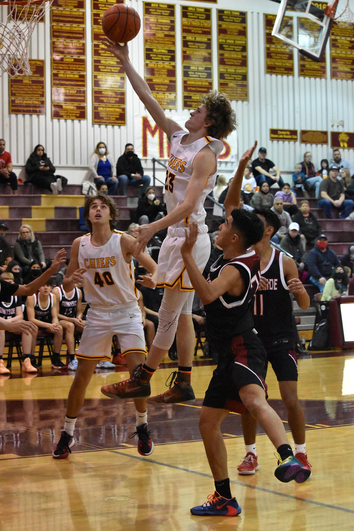 Moses Lake High School junior Blaine Macdonald (23) goes in for a layup during the Moses Lake versus Sunnyside High School matchup on Saturday.