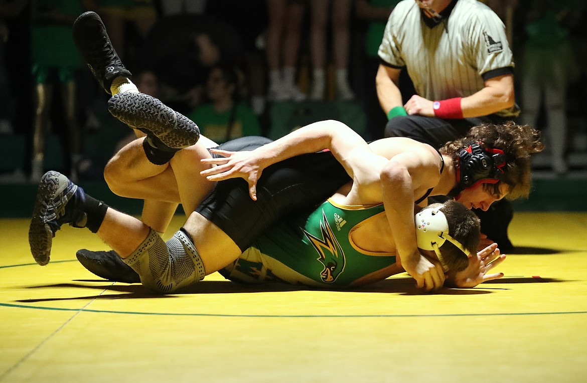 Darrian Resso (top) takes control during his match at Friday's dual.