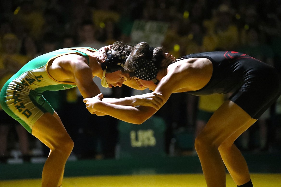 Kaiden Rose (right) squares off with his opponent Friday.