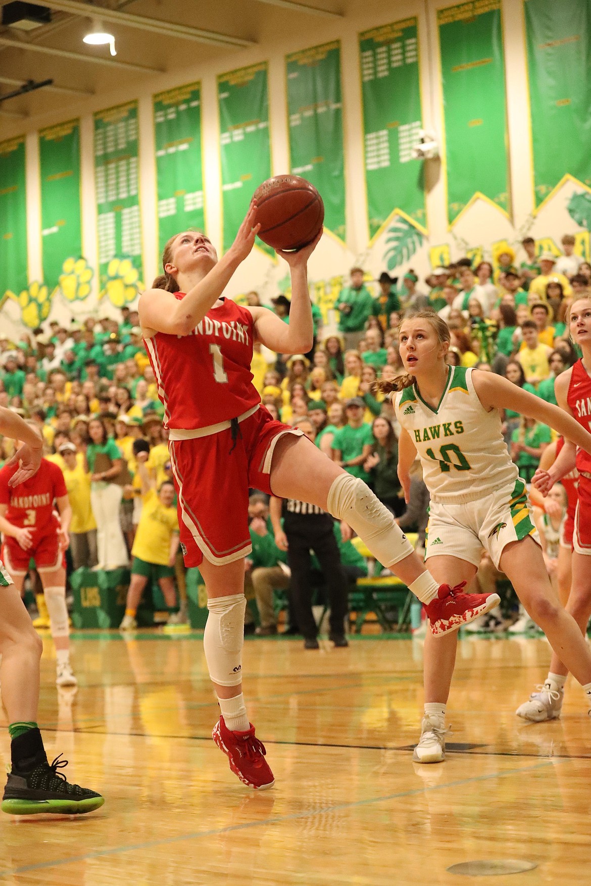 Kelsey Cessna attacks the basket and converts a layup Friday.