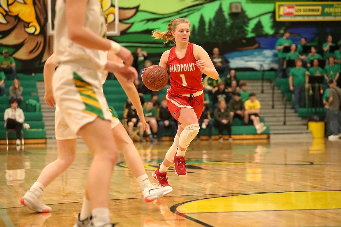 Kelsey Cessna drives toward the basket Friday.