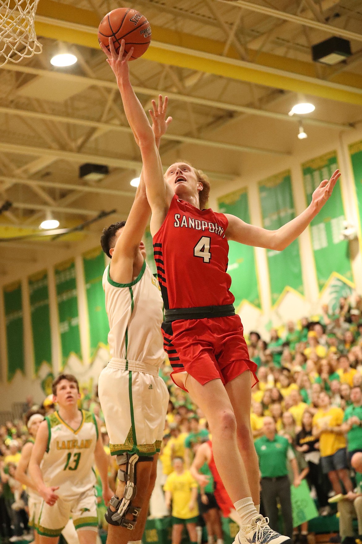 Rusty Lee elevates for a layup Friday.