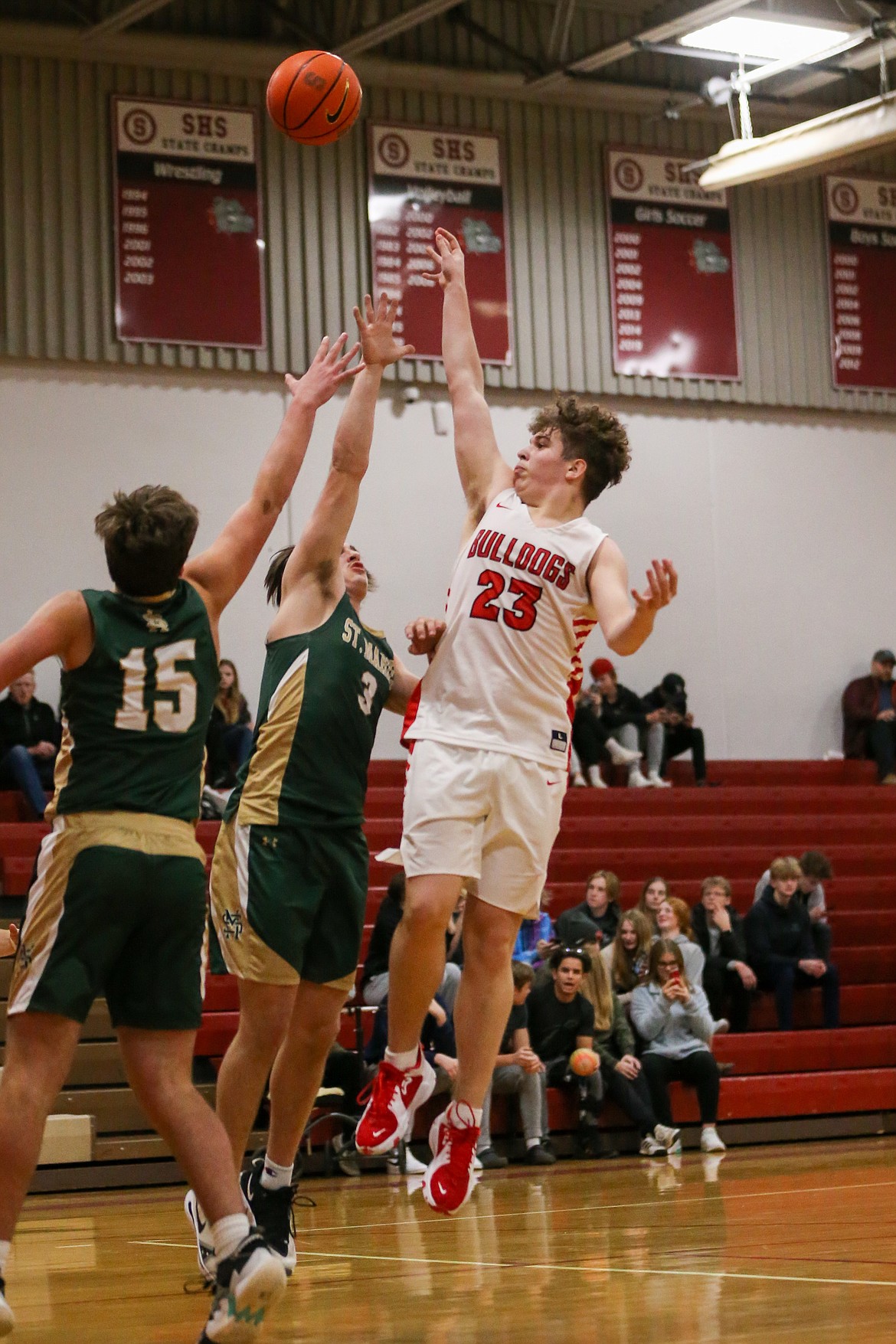 Parker Childs attempts a shot over a St. Maries defender Tuesday.