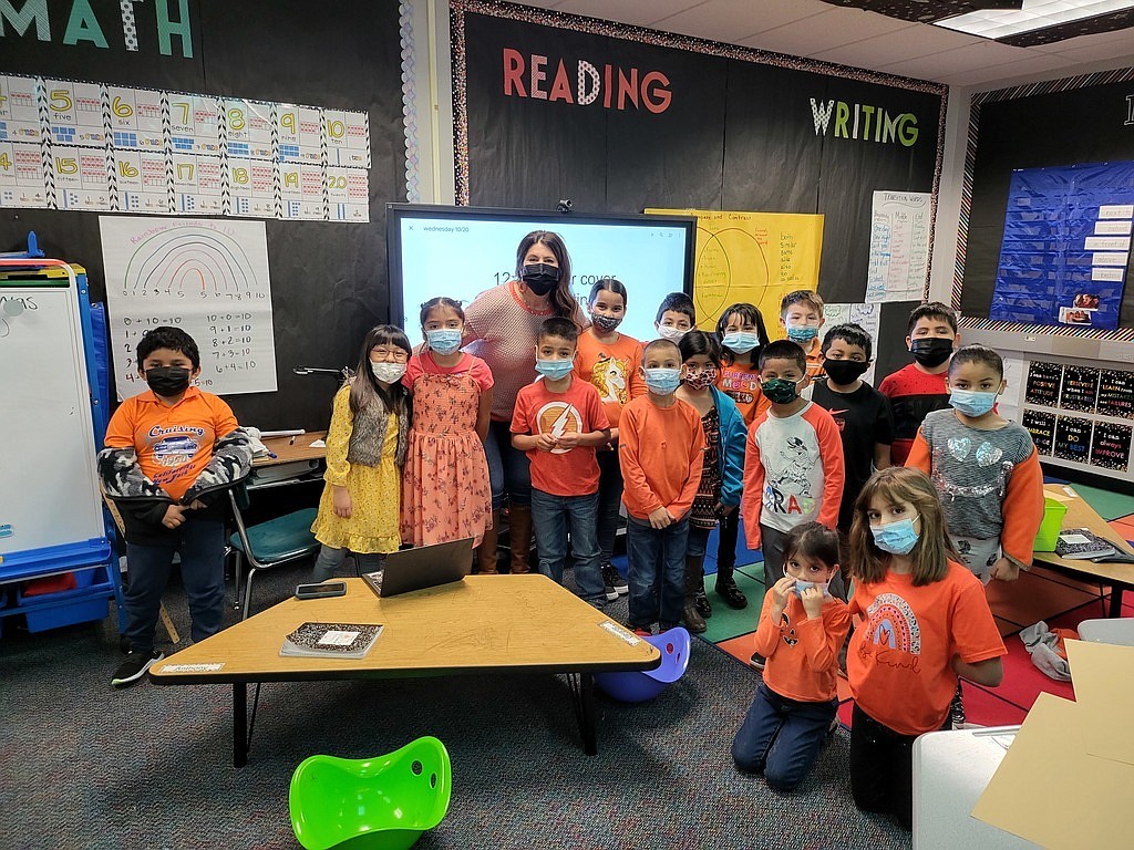 Students in Christina Kavanaugh’s second grade class at Morris Schott STEAM Elementary School show off their Unity Day shirts.