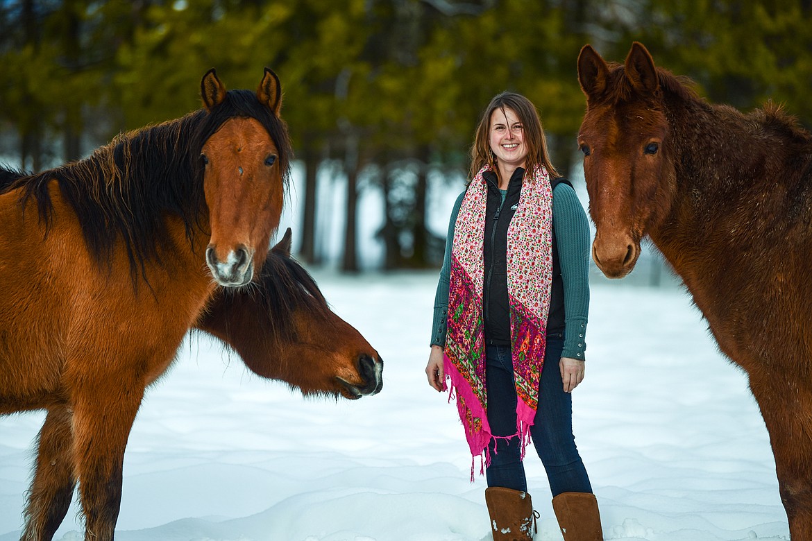 Katie Rose with her horses Annie, Harold and Johnny Cash at Come Alive Healing Adventures on Friday, Jan. 21. (Casey Kreider/Daily Inter Lake)