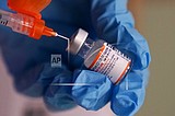 Pfizer begins testing omicron-matched COVID shots in adults
