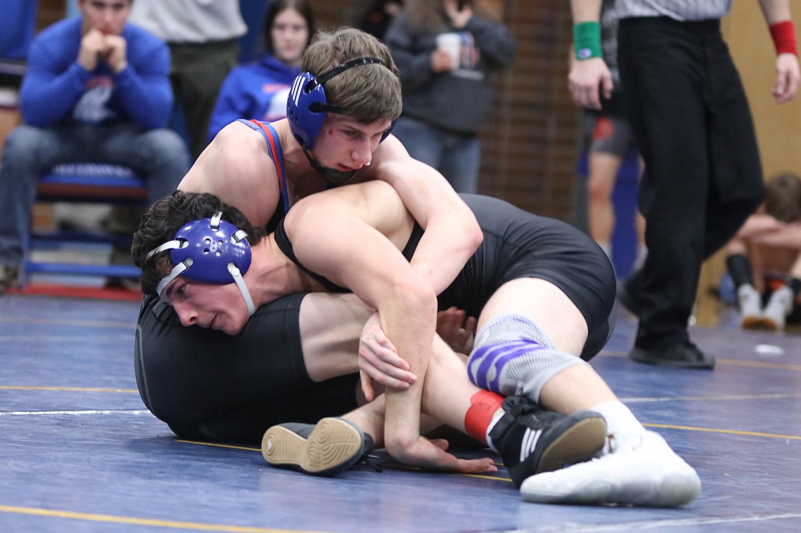 Bigfork's Ian Wolfe battles his way to a fourth-place finish at the Ted Kato Tournament in Thompson Falls. (Sally Anderson photo)