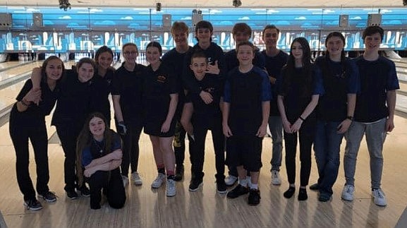 Courtesy photo
Post Falls High's boys and girls bowling teams each won district championships Sunday at Sunset Bowling Center in Coeur d'Alene. In the front (on her knee) is Jordyn Cord; standing in the front row from left are Allie Rider, Addison Mueller, Katie Dewey, Isabella Powell, Katelyn Moylan, Donald Shaw, Alex Walker, Roxy Cummings, Reagan Willey; and Eric Campbell; and back row from left, Bladen Huffaker, Alex Higgins, Skyler Huber and Jayson Austin.