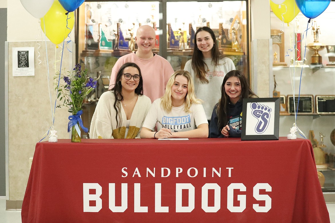 Tori Pelkey celebrates her commitment with teammates and friends Tuesday.