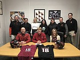 Signing photos Feb. 22, 2022