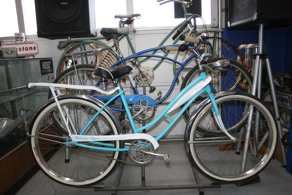 Bikes greet the customer at the door of Shade Tree Customs in Moses Lake on Tuesday.