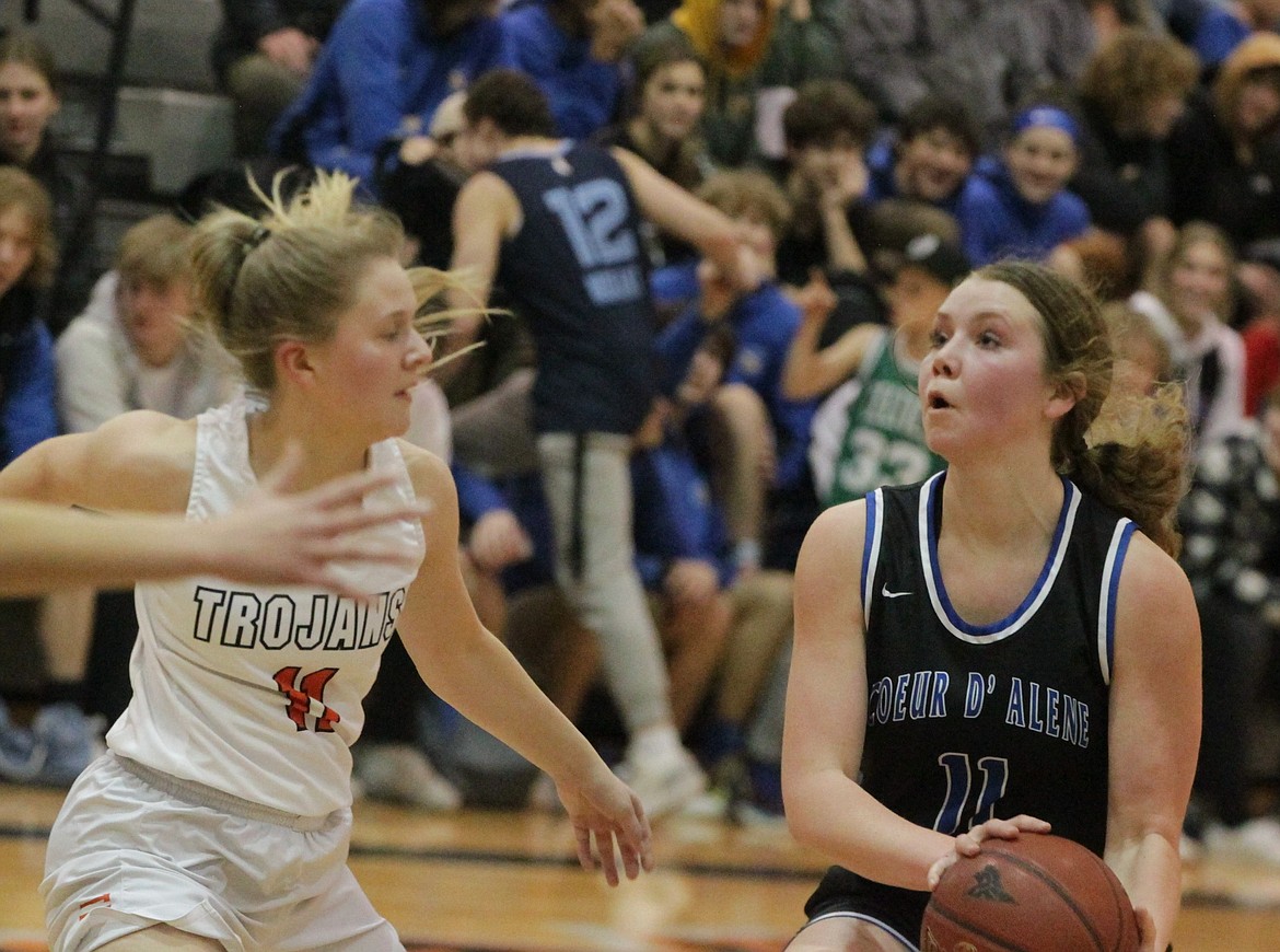 JASON ELLIOTT/Press
Coeur d'Alene junior guard Madi Symons pulls up for a jumper during the fourth quarter of Thursday's game at Post Falls High.