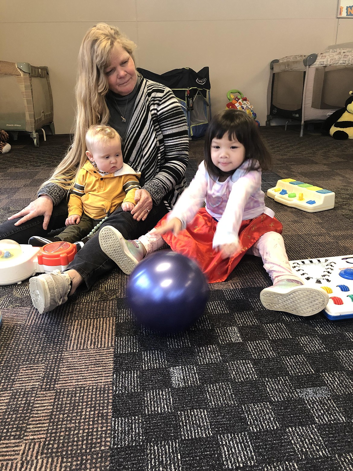 Stephanie Jognson of Aunt Stephanie's Child Care, with Niall Oliver and Jenna Neuiyen.