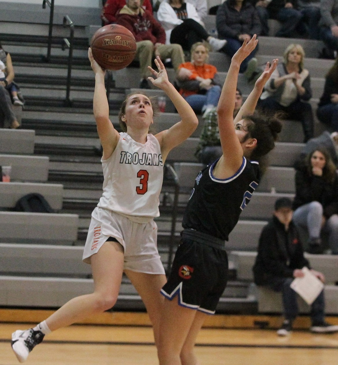 JASON ELLIOTT/Press
Post Falls senior guard Trinidie Nichols looks to drive past Coeur d'Alene sophomore guard Madison Mitchell during the second quarter of Thursday's Inland Empire League game at The Arena.