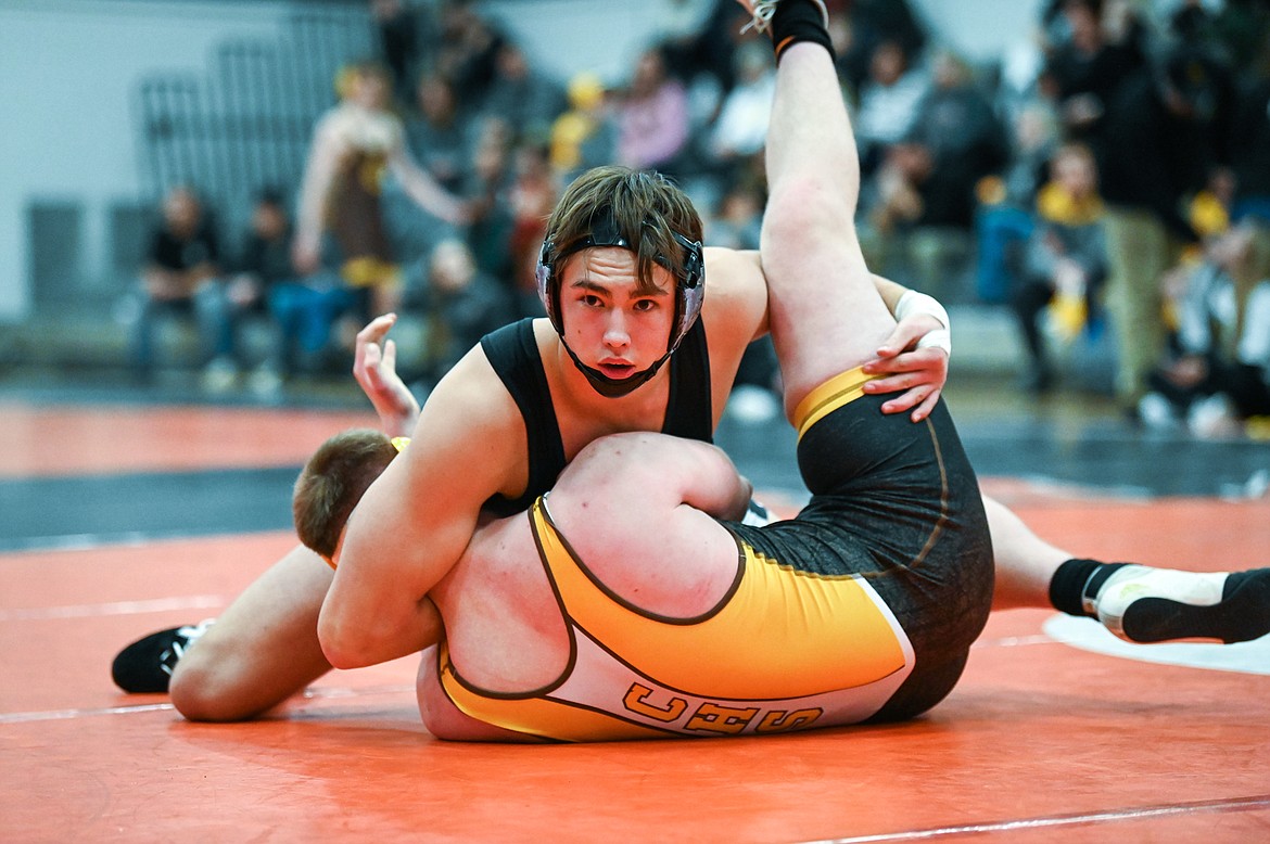 Flathead's Chase Youso wrestles Helena Capital's Josh Peterson at 205 pounds at Flathead High School on Friday, Jan. 28. (Casey Kreider/Daily Inter Lake)