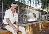 ‘Tiger King’ Joe Exotic resentenced to 21 years in prison