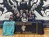 Signing photos Feb. 23, 2022