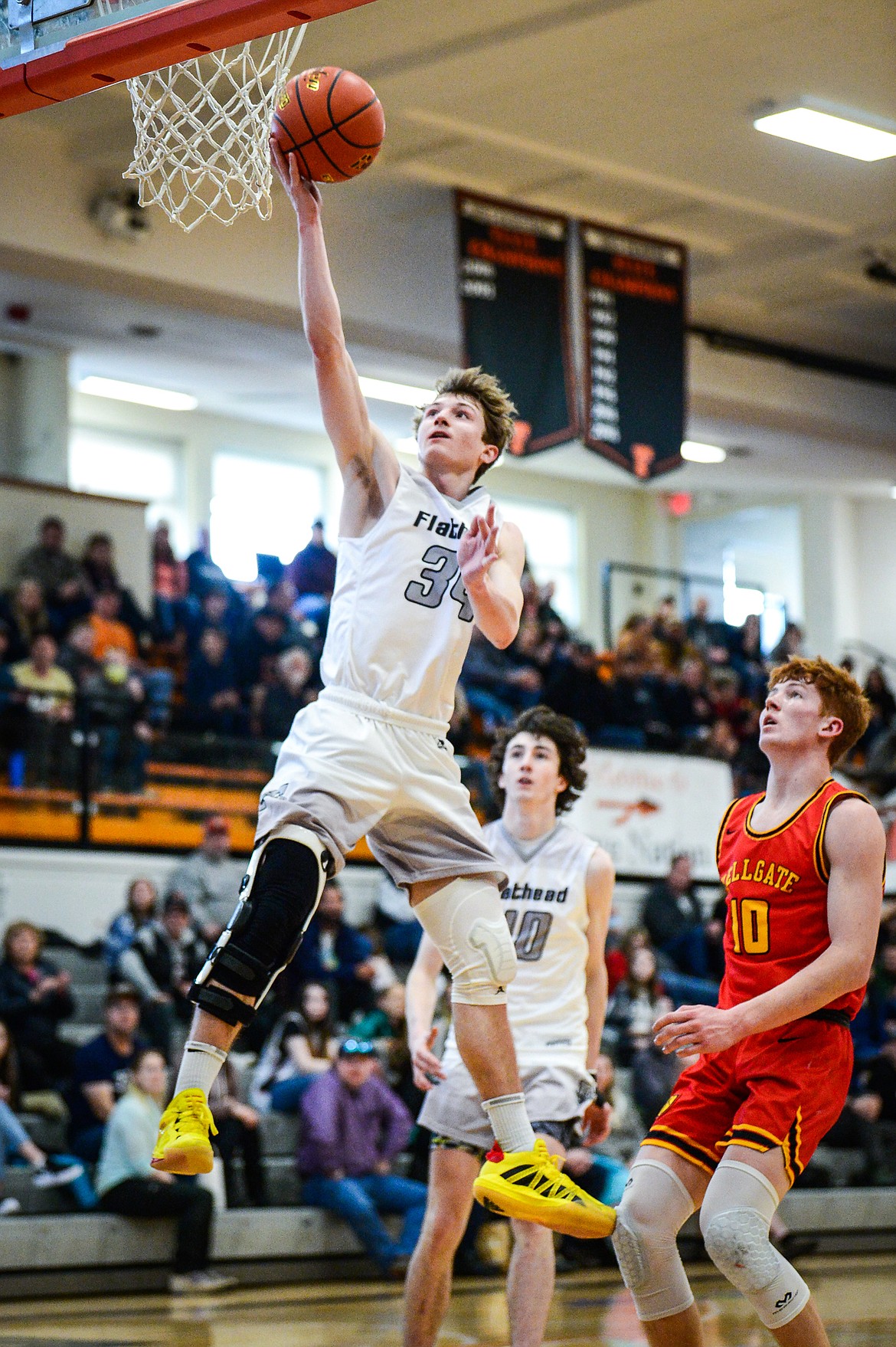 Flathead's Joston Cripe (34) drives to the basket against Missoula Hellgate at Flathead High School on Saturday, Jan. 29. (Casey Kreider/Daily Inter Lake)