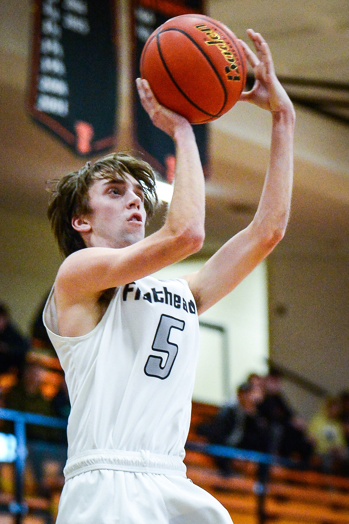 Flathead's Drew Lowry (5) looks to shoot against Missoula Hellgate at Flathead High School on Saturday, Jan. 29. (Casey Kreider/Daily Inter Lake)