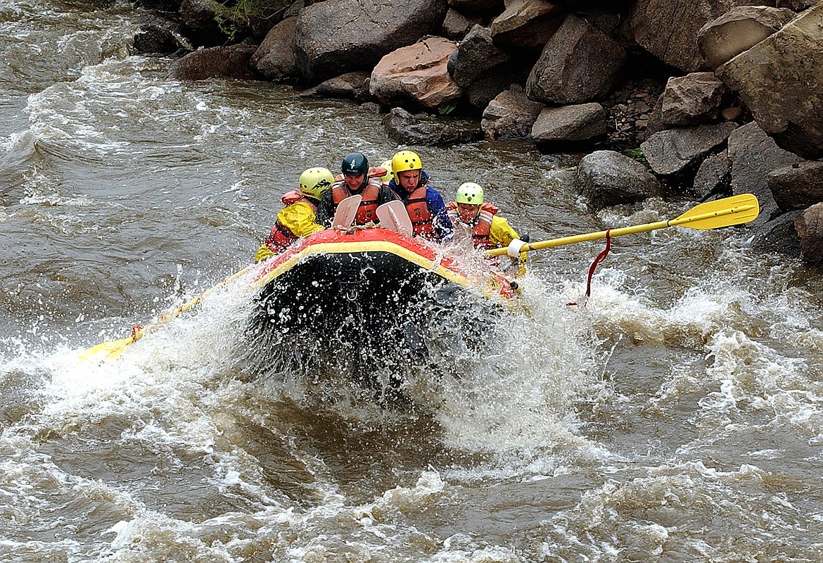 Rafters navigate the whitewater rapids on the Arkansas River in this file photo taken near Salida, Colo. (AP FILE)