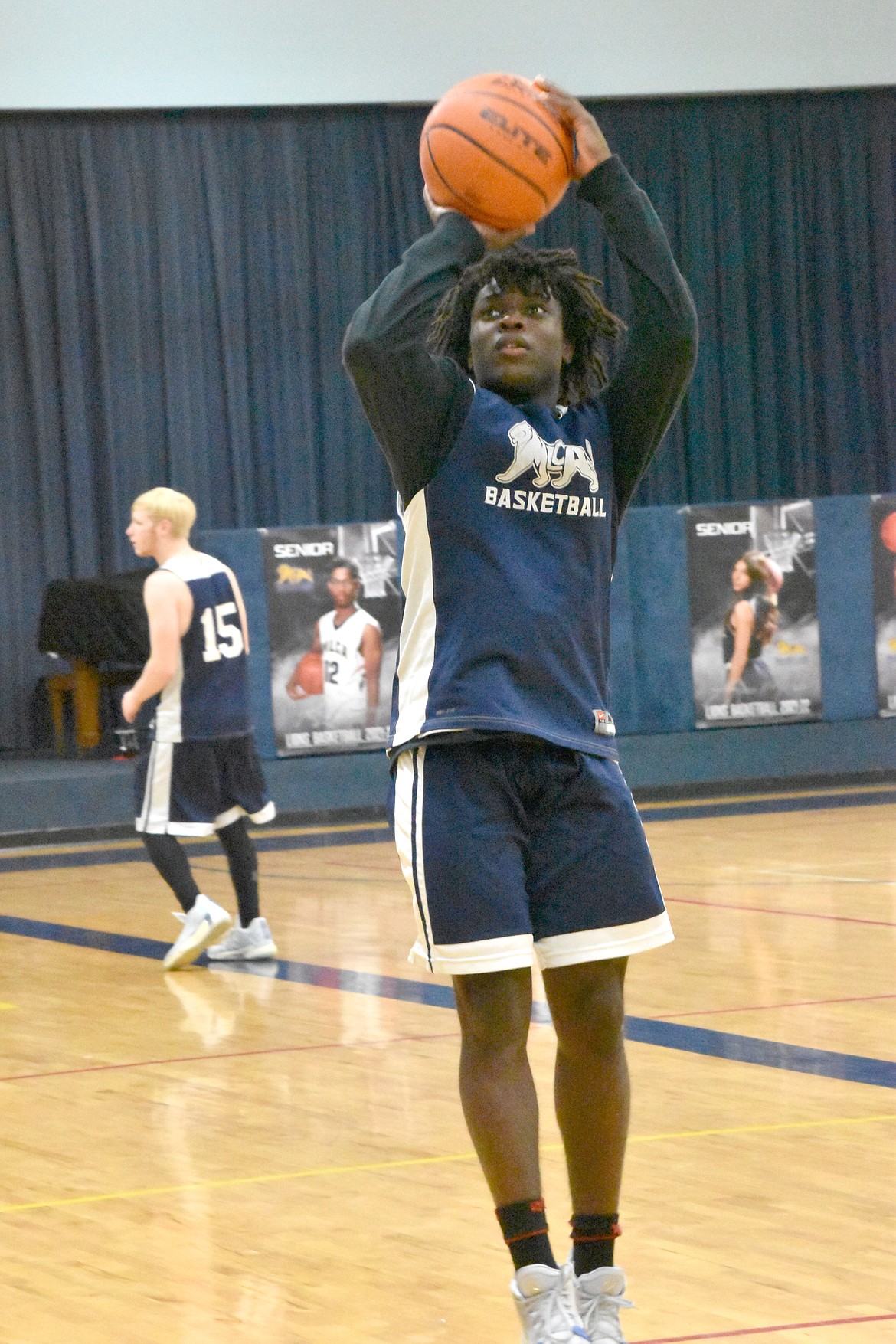 Moses Lake Christian Academy/Covenant Christian School senior Pierre Boorman practices his shooting on Wednesday.