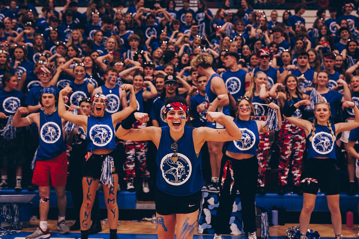 CHRISTINE WOELLER PHOTOGRAPHY
From left: Coeur d'Alene High's Evan Mallory, Gracie Shawver, Skylar Burke, Jacob Wuolle (21), Kaylea Cox, Kalena Flowers showing their Viking spirit during the boys basketball game against Lake City on Jan. 21 at Viking Cout.