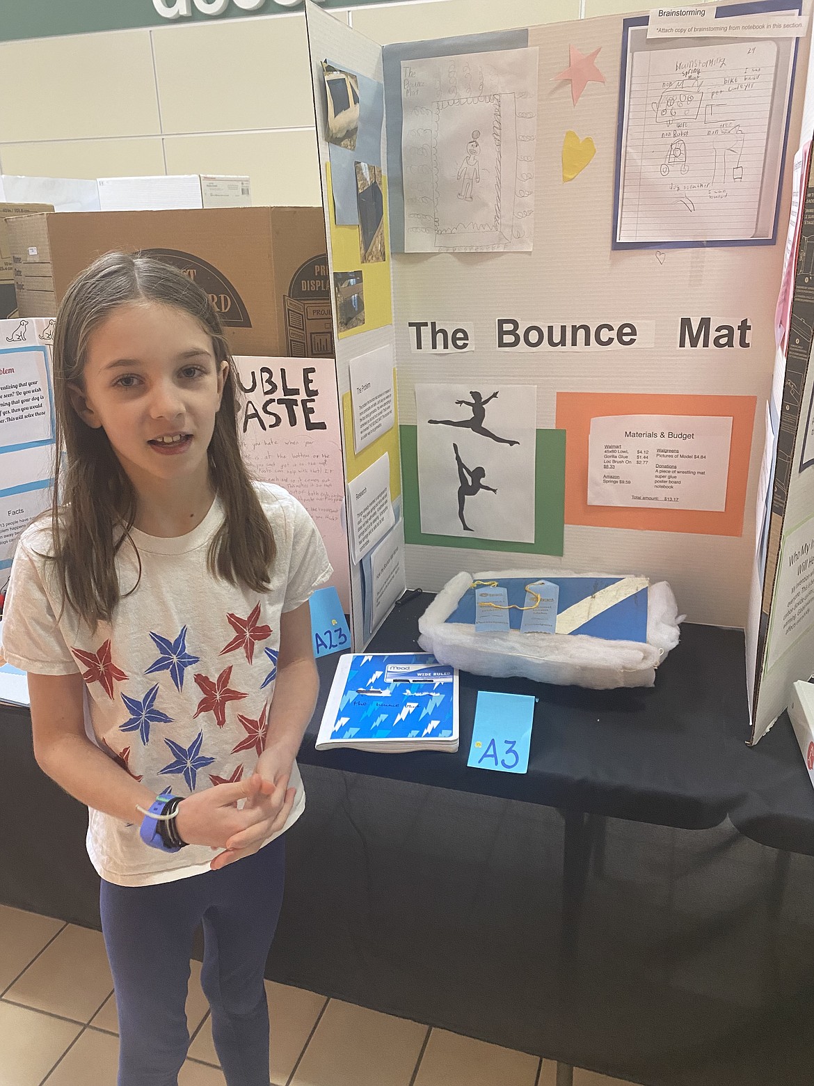 Chaisie Schwab, a third grader at Bryan Elementary School, competed for her first time this year in the Invent Idaho competition, Sunday. Her invention, "The Bounce Mat," is something "in-between a trampoline and a gymnastics mat." Inspired by her enjoyment of doing gymnastics on the field during recess, Schwab's idea is to make gymnastics more comfortable to do, she said, at the North Idaho regional held at the Silver Lake Mall.