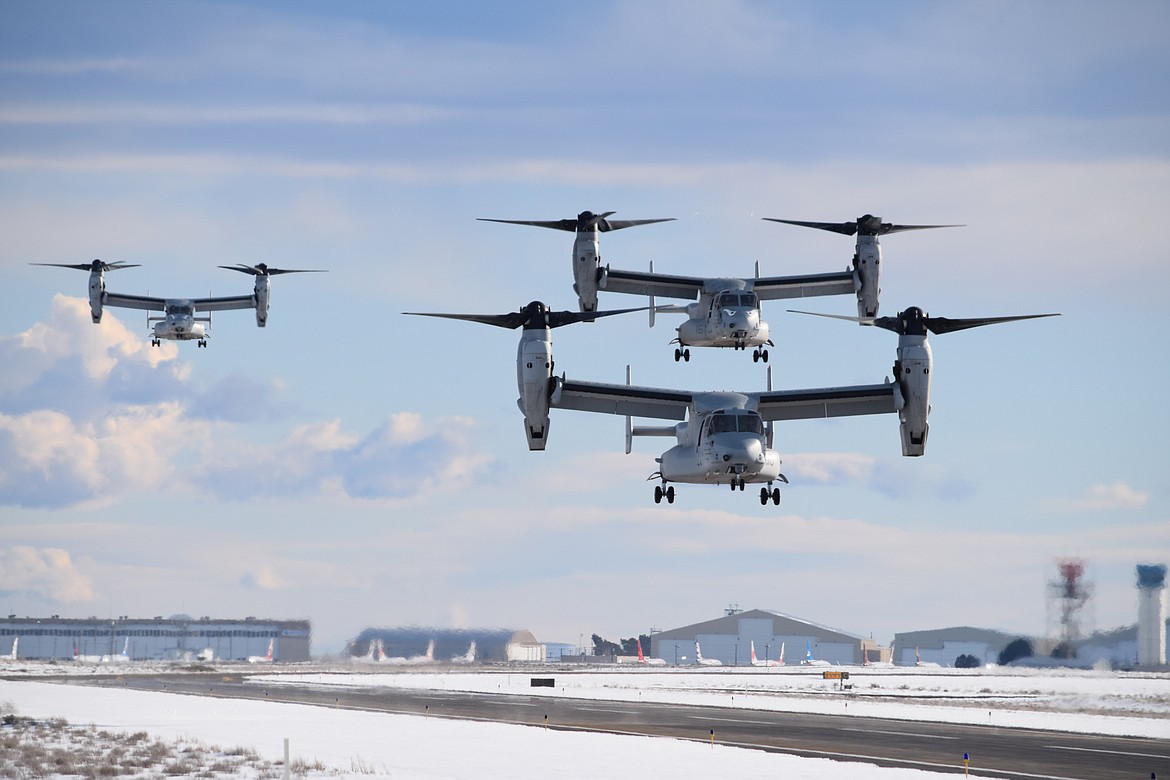 A trio of tilt-rotor MV-22 Osprey transports carrying Marines from California prepare to land at the Grant County International Airport on Monday as part of the Winter Fury 22 military exercise.