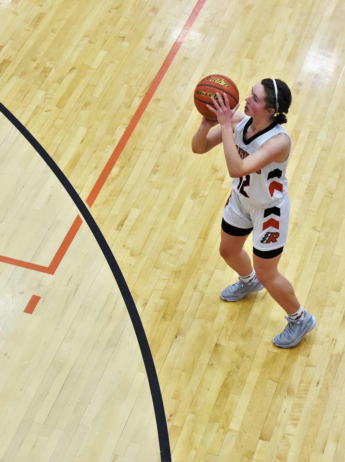 Ronan's Olivia Heiner lines up a long-range shot against Mission. (Scot Heisel/Lake County Leader)