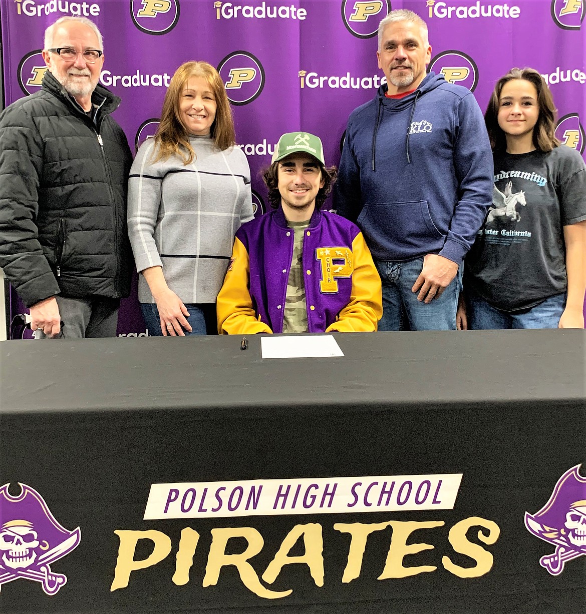 Polson High School senior Ryan Dupuis and his family celebrated his commitment to compete in track and field for the Orediggers of Montana Tech during a signing ceremony at the school on Jan. 28. Dupuis plans to study data science. (Courtesy photo)