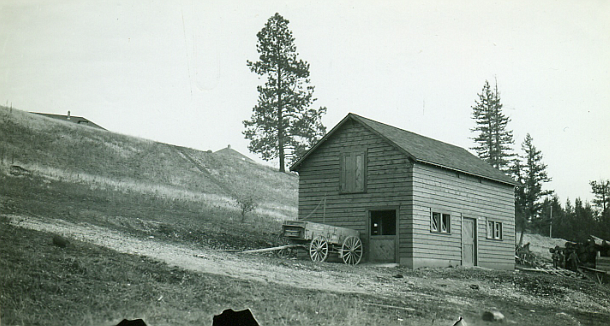 1937 picture of the lower barn nearing completion.
This shot is looking back up the hill towards the remainder of the new buildings. (Forest Service Northern Region Archives)