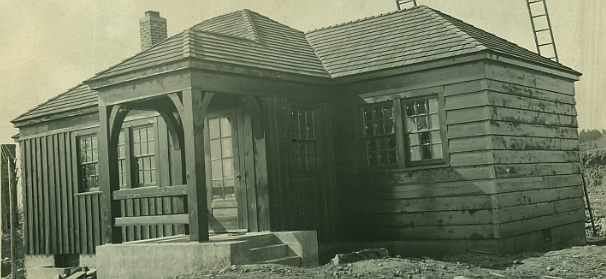 1937 picture of the then new ranger stations administration building nearing completion. (Forest Service Northern Region Archives)