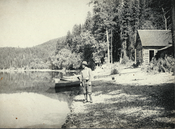 Ranger and Station on the east shore of Swan Lake, Montana.  This is
where the U.S. Forest Service campground and boat ramp are now located. (Denny Kellogg Collection)