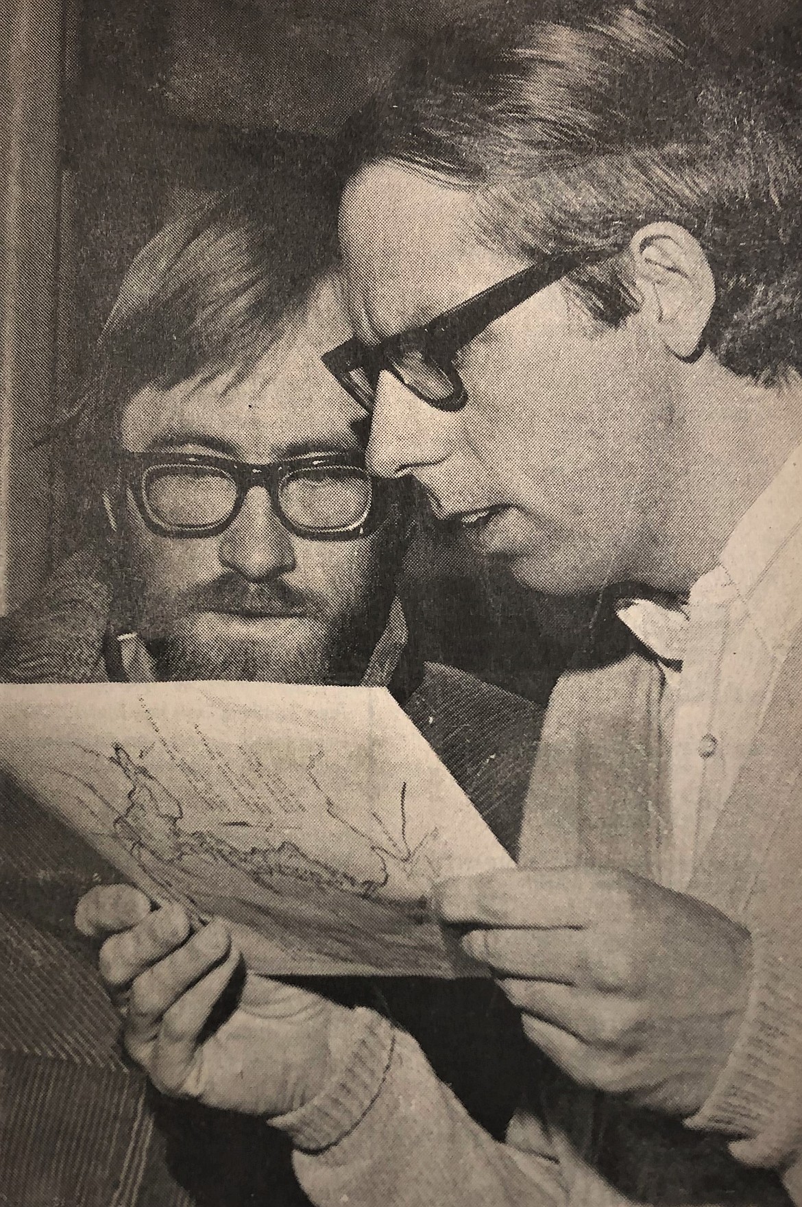 NIC instructors William Hubbard, left, and Tony Stewart study a city map before the 1972 petition drive.