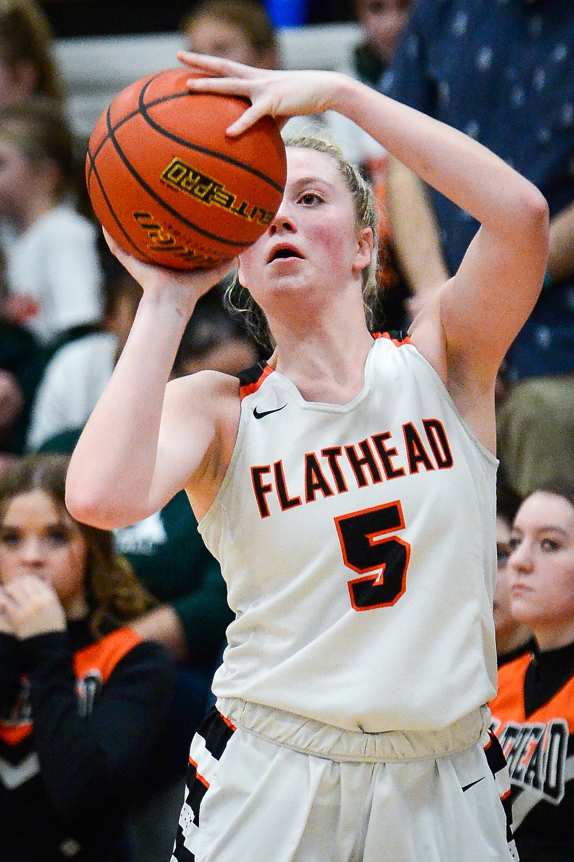 Flathead's Maddy Moy (5) sinks a three against Butte at Flathead High School on Friday, Feb. 4. (Casey Kreider/Daily Inter Lake)