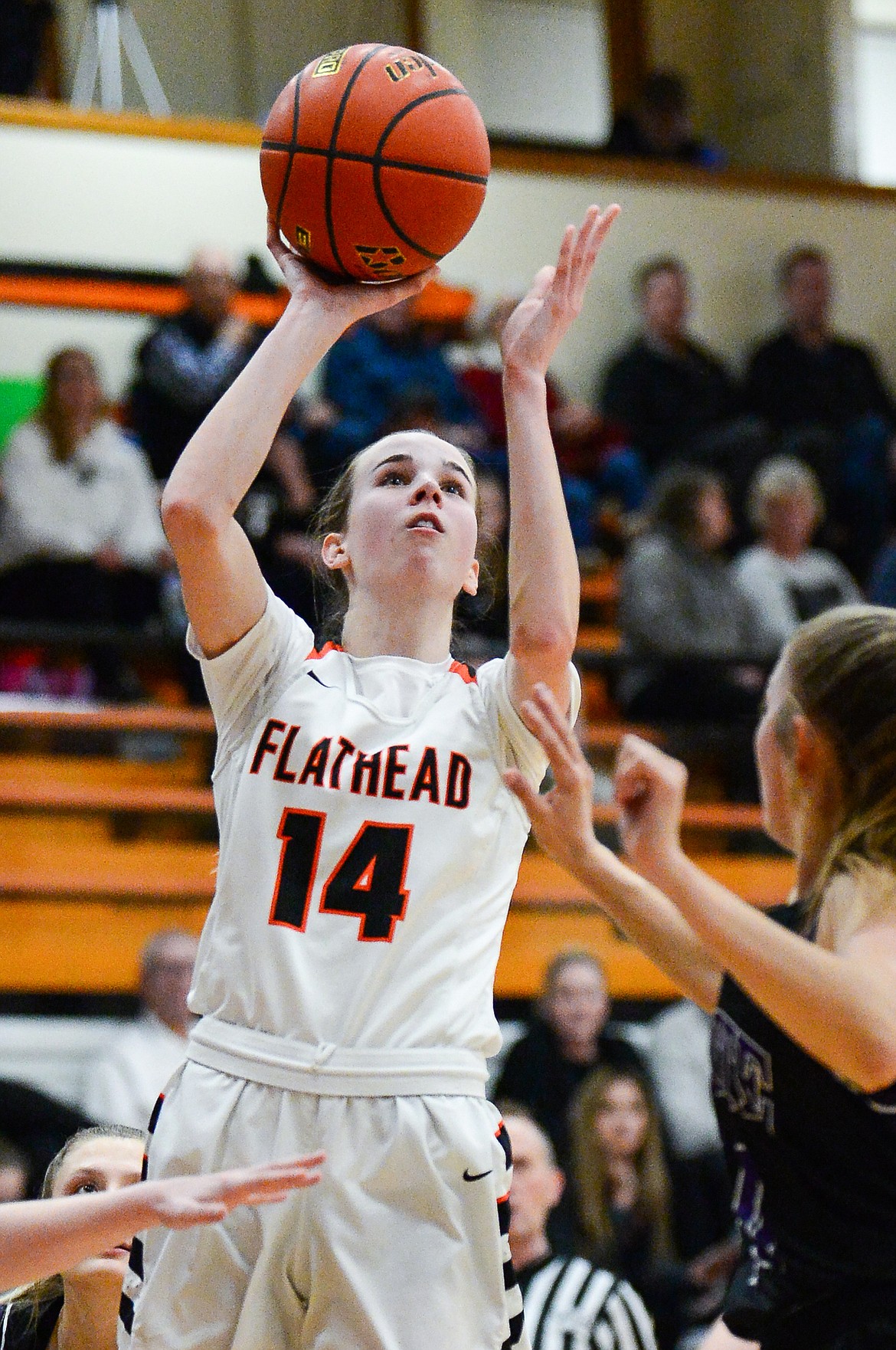 Flathead's Kennedy Moore (14) looks to shoot against Butte at Flathead High School on Friday, Feb. 4. (Casey Kreider/Daily Inter Lake)